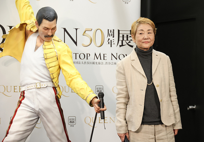 QUEEN 50th Anniversary Exhibition  Press Preview November 11, 2021, Tokyo, Japan   Japanese music critic Kaoruko Togo smiles with a doll of Freddie Mercury, vocalist of British rock band Queen at an opening event of the Queen s 50th anniversary exhibition in Tokyo on Thursday, November 11, 2021. The Queen s 50th anniversary exhibition will be held from November 12 through February 13 next year.      Photo by Yoshio Tsunoda AFLO  