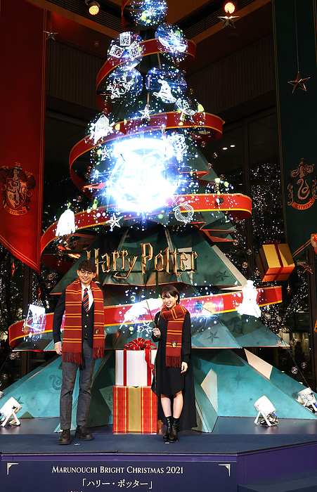 A large Christmas tree featuring Harry Potter movie is displayed November 11, 2021, Tokyo, Japan   Japanese actor Harry Sugiyama  L  and actress Mirai Shida  R  attend a lighting ceremony for a large Christmas tree at Marunouchi business district in Tokyo on Thursday, November 11, 2021. The large Christmas tree, featuring the fantastic movie Harry Potter to celebrate the 20th anniversary of the first Harry Potter movie, will be displayed through the Christmas Day.      Photo by Yoshio Tsunoda AFLO 