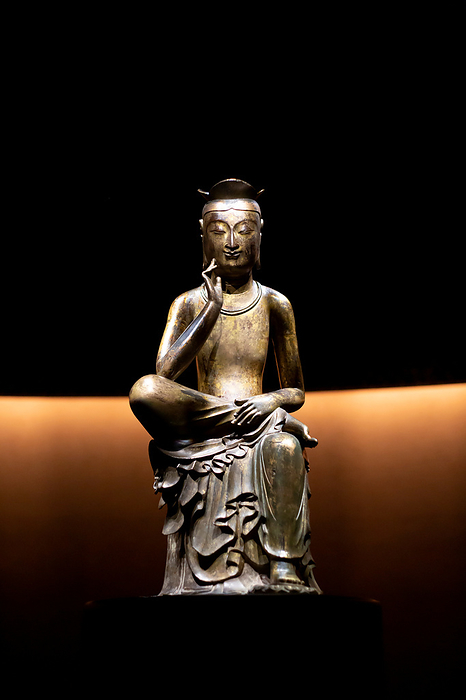 South Korea s Buddhist statue treasures are on permanent display in Seoul Pensive Bodhisattva, Nov 11, 2021 : A Pensive Bodhisattva  early 7th century , National Treasure 83 of South Korea, is displayed at the National Museum of Korea in Seoul, South Korea. The museum opened a permanent exhibition space named  Room of Quiet Contemplation  for two gilt bronze Buddhist statues of Pensive Bodhisattva  Bangasayusang , which are national treasures.  Photo by Lee Jae Won AFLO   SOUTH KOREA 