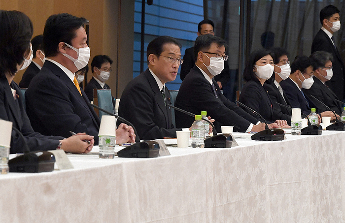 Prime Minister Fumio Kishida  third from left  speaks at the Conference on the Realization of the Digital Rural City National Vision. Kenji Wakamiya, Minister of State for World Expositions, is second. Prime Minister Fumio Kishida  third from left  speaks at a conference on the realization of the Digital Rural City National Vision. The second is Taketsugu Wakamiya, Minister of State for World Expositions, at the Prime Minister s official residence at 11:12 a.m. on November 11, 2021  photo by Miki Takeuchi .