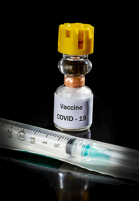 Medical Vaccine COVID-19 vial and syringe on a black background; Studio, Photo by Michael Interisano / Design Pics