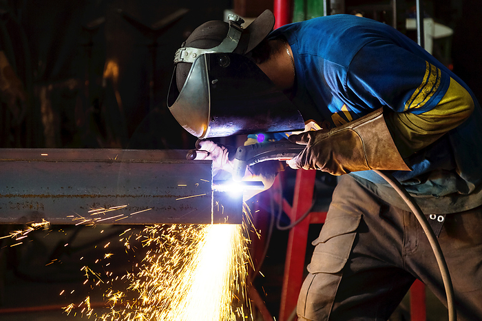 welder Structural steel skid fabrication using a MIG welder  Innisfail, Alberta, Canada, Photo by LJM Photo   Design Pics