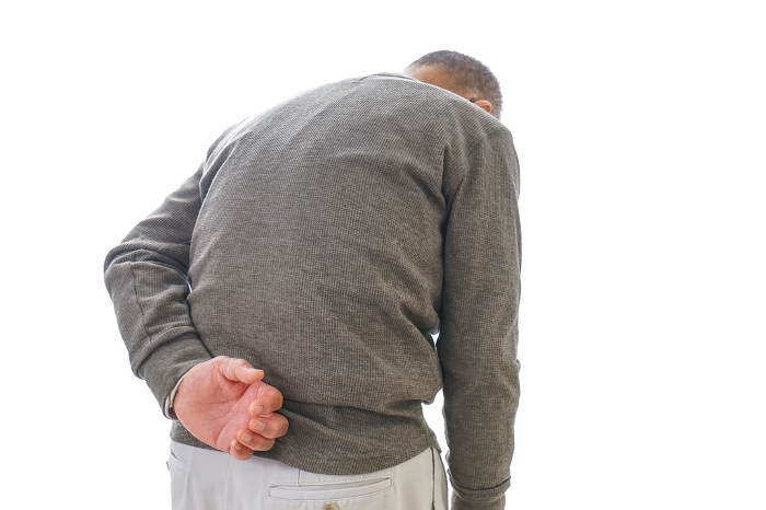 Senior man suffering from back pain