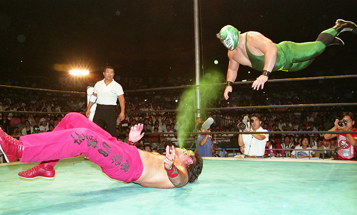 1991 New Japan Pro Wrestling, Yomiuriland Tournament August 25, 1991, New Japan Pro Wrestling: The Great Muta intercepts Super Strong Machine  right , who attempts a diving headbutt from the corner, with a poison mist at Yomiuriland Theater EAST in Kawasaki, Kanagawa, Japan.