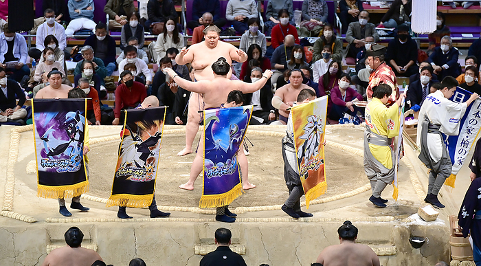 Kyusyu Grand Sumo Tournament, Sen agura A Pok mon prize flag at the opening match between Itsunojo and Akio at the Kyushu Grand Sumo Tournament, November 28, 2021  photo date: November 28, 2021 