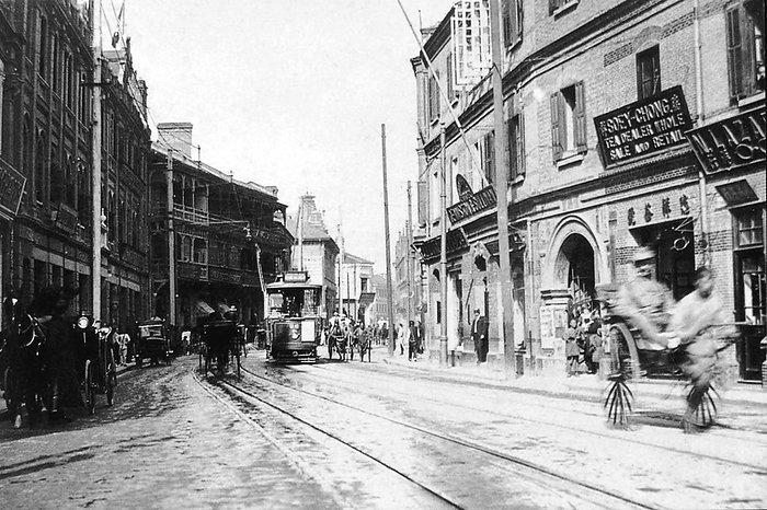 China: Shanghai s Nanjing Road with tram, rickshaw and shops c.1910. International attention to Shanghai grew in the 19th century due to its economic and trade potential at the Yangtze River.  The war ended with the 1842 Treaty of Nanjing, opening Shanghai and other ports to international trade.  br   br  The war ended with the 1842 Treaty of Nanjing, opening Shanghai and other ports to international trade.  In 1863, the British settlement, located to the south of Suzhou creek  Huangpu district , and the American settlement, to the north of Suzhou creek  Hongkou district , joined.  The French opted out of the Shanghai Municipal Council, and maintained its own French Concession.  br   br  The French opted out of the Shanghai Municipal Council, and maintained its own French Concession.  Citizens of many countries and all continents came to Shanghai to live and work during the ensuing decades  those who stayed for long periods called themselves  Shanghailanders . In the 1920s and 30s, the Shanghai War was a major factor in the economic growth of the country. In the 1920s and 30s, some 20,000 so called White Russians and Russian Jews fled the newly established Soviet Union and took up residence in Shanghai. In the 1920s and 30s, some 20,000 so called White Russians and Russian Jews fled the newly established Soviet Union and took up residence in Shanghai.