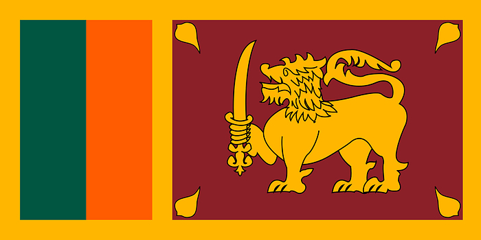 Sri Lanka: Flag of Sri Lanka, 1972   present day. The Flag of Sri Lanka, also called the Lion Flag, consists of a gold lion, holding a sword in its right fore paw, in front of a crimson background with four Around the background is a yellow border, and to its left are two vertical stripes of equal size in saffron and green, with the saffron stripe closest to the left corner. The lion represents bravery, and the four bo leaves represent meththa, karuna, muditha and upeksha. The orange stripe represents the Sri Lankan Tamils, the green stripe represents Sri Lankan Moors, the crimson background represents European Burghers and is also a reference to the rich colonial background of the country and the yellow border represents other ethnic groups such as Sri Lankan Malays etc. br   br  The orange stripe represents the Sri Lankan Tamils, the green stripe represents Sri Lankan Moors, the crimson background represents European Burghers and is also a  Sri Lanka had always been an important port and trading post in the ancient world, and was increasingly frequented by merchant ships from the Middle East, The islands were known to the first European explorers of South Asia and settled by many groups of Arab and Malayan explorers. The islands were known to the first European explorers of South Asia and settled by many groups of Arab and Malay merchants. br   br  The islands were known to the first European explorers of South Asia and  A Portuguese colonial mission arrived on the island in 1505 headed by Lourenteao de Almeida, the son of Francisco de Almeida. At that point the island consisted of three kingdoms, namely Kandy in the central hills, Kotte at the Western coast, and Yarlpanam  Anglicised Jaffna  in the north. The British East India Company took over the coastal regions controlled by the Dutch in 1796, and in 1802 these provinces were declared a crown colony under the Dutch. The British East India Company took over the coastal provinces controlled by the Dutch in 1796, and in 1802 these provinces were declared a crown colony under direct rule of the British government, therefore the island was not part of the British Raj. The annexation of the Kingdom of Kandy in 1815 by the Kandyan convention, unified the island under British rule. br   br   br  The annexation of the Kingdom of Kandy in 1815 by the Kandyan convention, unified the island under British rule.  European colonists established a series of cinnamon, sugar, coffee, indigo cultivation followed by tea and rubber plantations and graphite mining. Briti