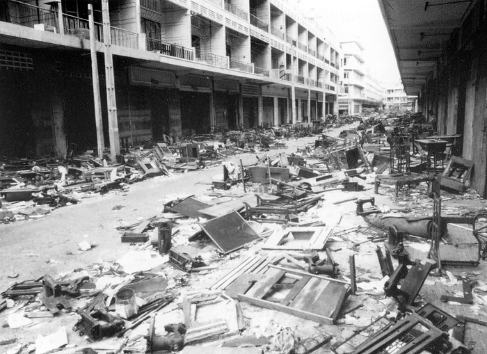 Cambodia: Khmer Rouge Aftermath: An abandoned street in Phnom Penh, 1979. The Khmer Rouge, or Communist Party of Kampuchea, ruled Cambodia from 1975 to 1979, led by Pol Pot, Nuon Chea, Ieng Sary, Son Sen and Khieu Samphan. It is remembered primarily for its brutality and policy of social engineering which resulted in millions of deaths. Its attempts at agricultural reform led to widespread famine, while its insistence on absolute self sufficiency, even in the supply of medicine, led to the deaths of thousands from treatable diseases  such as malaria . Brutal and arbitrary executions and torture carried out by its cadres against perceived subversive elements, or during purges of its own ranks between 1976 and 1978, are considered to have constituted a genocide. Several former Khmer Rouge cadres are currently on trial for war crimes in Phnom Penh. 