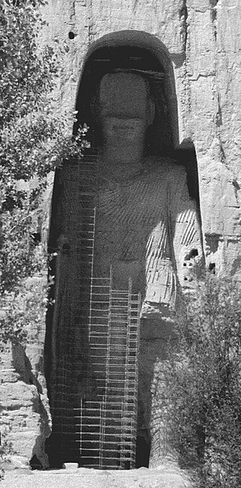 Afghanistan: Bamian Buddha in 1979. The Buddhas of Bamiyan were two 6th century monumental statues of standing buddhas carved into the side of a cliff in the Bamiyan valley in the Hazarajat Bamiyan was two 6th century monumental statues of standing buddhas carved into the side of a cliff in the Bamiyan valley in the Hazarajat region of central Afghanistan, situated 230 km  143 miles  northwest of Kabul at an altitude of 2,500 meters  8,202 ft .  br   br    Built in 507 CE, the larger in 554 CE, the statues represented the classic blended style of Gandhara art. The main bodies were hewn directly from the sandstone cliffs, but details were modeled in mud mixed with straw, coated with stucco. This coating, practically all of which was worn away long ago, was painted to enhance the expressions of the faces, hands and folds of the robes  the larger one was painted carmine red and the smaller one was painted Multiple colors. br   br    The lower parts of the statues  arms were constructed from the same mud straw mix while supported on wooden armatures. The rows of holes that can be seen in photographs were spaces that held wooden pegs which served to stabilize the outer stucco. The rows of holes that can be seen in photographs were spaces that held wooden pegs which served to stabilize the outer stucco. br   br   br  The rows of holes that can be seen in photographs were spaces that held wooden pegs which served to stabilize the outer stucco.  They were intentionally dynamited and destroyed in 2001 by the Taliban, on orders from leader Mullah Mohammed Omar, after the Taliban government declared that they were  idols . They were intentionally dynamited and destroyed in 2001 by the Taliban, on orders from leader Mullah Mohammed Omar, after the Taliban government declared that they were  idols. International opinion strongly condemned the destruction of the Buddhas, which was viewed as an example of the intolerance of the Taliban. Japan and Switzerland, among others, have pledged support for the rebuilding of the statues.