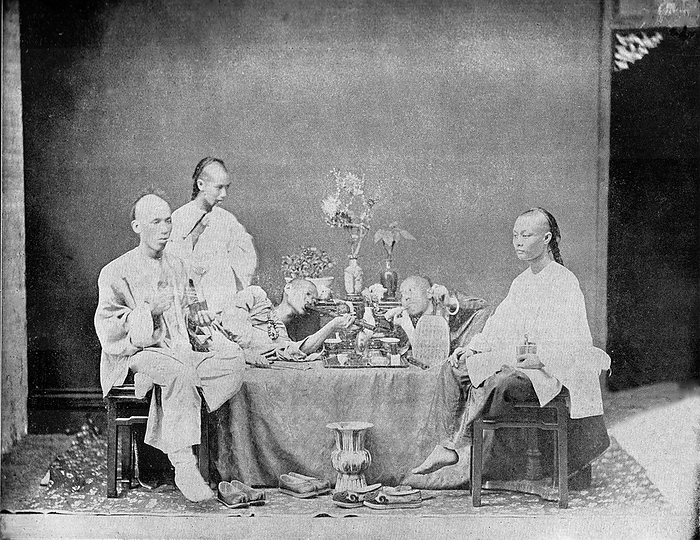 China: Group of opium smokers posed around a table, 1880s. The earliest description of the use of opium as a recreational drug in China comes from Xu Boling, who wrote in 1483 that opium was  mainly used to aid masculinity, strengthen sperm and regain vigor , and that it  enhances the art of alchemists, sex and court ladies .  br   br    He described an expedition sent by the Chenghua Emperor in 1483 to procure opium for a price  equal to that of gold  in Hainan, A century later, Li Shizhen listed standard medical uses of opium in his renowned Compendium of Materia Medica  1578 , but also wrote that  lay people use it for the art of sex , in particular the ability to  arrest seminal emission .  arrest seminal emission . This association of opium with sex continued in China until the twentieth century.  Opium smoking began as a privilege of the elite and remained a great luxury into the early 19th century, but by 1861, Wang Tao wrote that opium was used by rich peasants, and that even a small village without a rice store would have a shop where opium was sold.