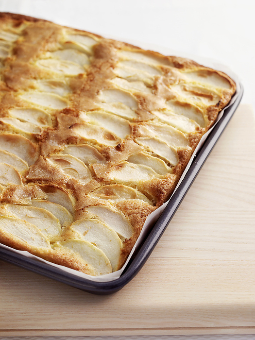 Toffee apple cake on baking tray Toffee apple cake on baking tray., Photo by DK IMAGES SCIENCE PHOTO LIBRARY