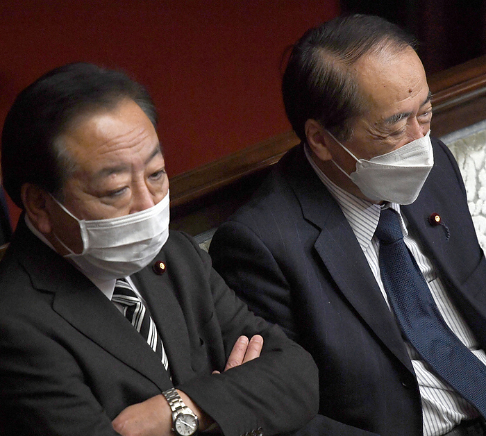 Former Prime Minister Yoshihiko Noda  left  and former Prime Minister Naoto Kan of the Constitutional Democratic Party of Japan attend a plenary session of the House of Representatives. Former Prime Minister Yoshihiko Noda  left  and former Prime Minister Naoto Kan of the Constitutional Democratic Party of Japan  DPJ  attend a plenary session of the House of Representatives at 4:53 p.m. on December 15, 2021, in the Diet.