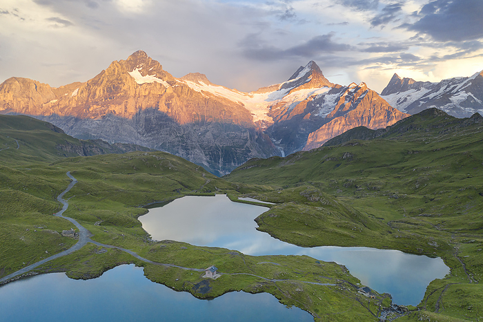 Grindelwald, Switzerland aerial view of Bachalpsee during a warm coloured sunset in summer time, Grindelwald, Canton of Bern, Switzerland, Europe, Photo by Carlo Conti
