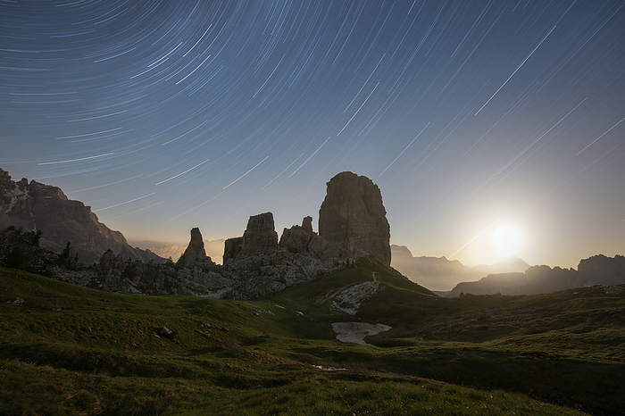 Dolomites, Italy a startrails with lunar sunrise photographed during a summer night near the Cinque Torri, Dolomiti, Unesco World Heritage Site municipality of Cortina d Ampezzo, Belluno province, Veneto district, Italy, Europe, Photo by Carlo Conti