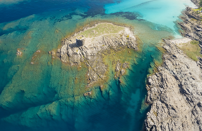 Sardinia, Italy Aerial view of the small island and the medieval tower of La Pelosa, Stintino, Asinara Gulf, Sassari district, Sardinia, Italy., Photo by Mirko Costantini