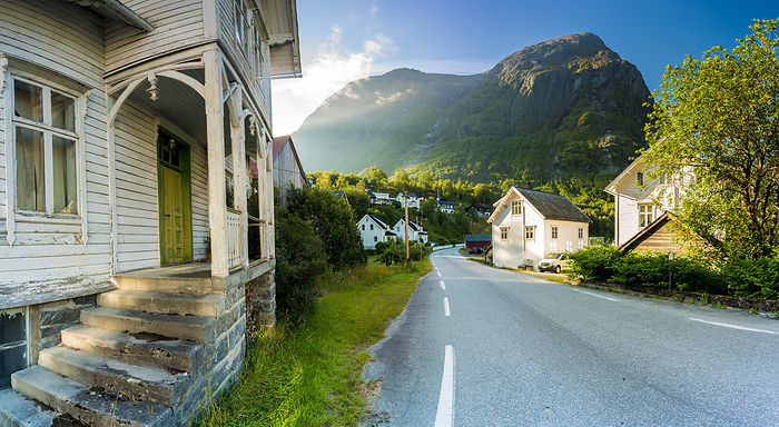Norway Panoramic of road along Hjelle village with mountains in background, Oppstryn, Sogn og Fjordane county, Norway, Photo by Roberto Moiola