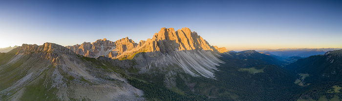 Dolomites, Italy Aerial panoramic of Dolomites mountains of Puez Odle nature park lit by sunset, South Tyrol, Bolzano province, Dolomites, Italy, Photo by Roberto Moiola
