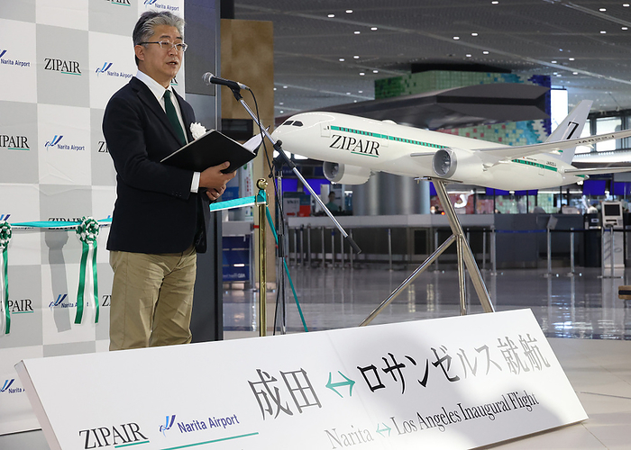 JAL s budget airline Zipair Tokyo launches the international route to Los Angeles December 25, 2021, Narita, Japan   Japan s budget airline Zipair Tokyo president Shingo Nishida delivers a speech as the airline launches the first flight from Narita to Los Angeles at the Narita international airport in Narita, suburban  Tokyo on Saturday, December 25, 2021. Japan Airlines   JAL  low cost carrier started its sixth international route to Los Angeles.      Photo by Yoshio Tsunoda AFLO  