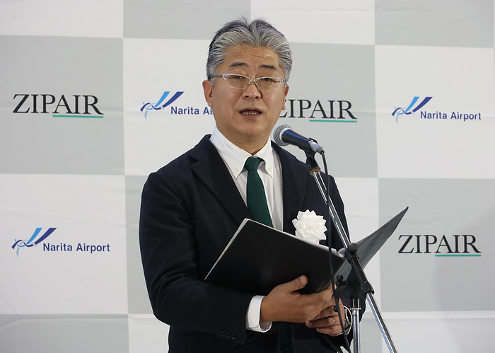 Low cost airline ZipAir launched Narita Los Angeles route. December 25, 2021, Narita, Japan   Japan s budget airline Zipair Tokyo president Shingo Nishida delivers a speech as the airline launches the first flight from Narita to Los Angeles at the Narita international airport in Narita, suburban  Tokyo on Saturday, December 25, 2021. Japan Airlines   JAL  low cost carrier started its sixth international route to Los Angeles.      Photo by Yoshio Tsunoda AFLO  
