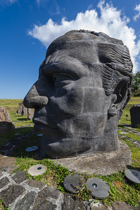 Large, stone bust of Louis Delgres at the memorial site at Fort Louis Delgres; Basse-Terre, Guadeloupe, French West Indies, Photo by Alberto Biscaro / Design Pics