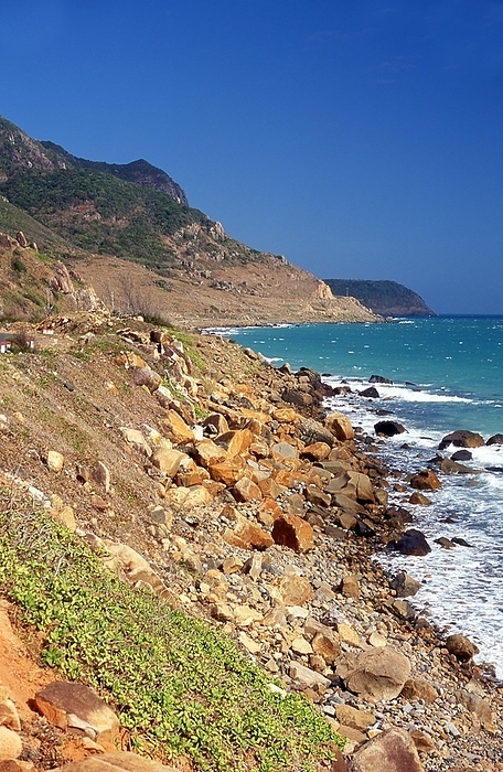 Vietnam: The rocky coastline of Con Son Island, Con Dao National Park, Con Dao Archipelago The Con Dao Islands  Vietnamese: C n   o  are an archipelago of B  R a V ng T u Province, in southeastern Vietnam, and are a Situated at about 185 km  115 mi  from V ng T u and 230 km  143 mi  from H  Ch  Minh City  Saigon , the group includes The total land area is 75 sq km, and the local population is about 5,000. The island group is served by C   ng  br   br   br  The island group is served by C   ng Airport.  The archipelago was formerly known as Poulo Condore, and it is mentioned under a variant of this Malay name by Marco Polo in the early 14th century. On June 16, 1702, the English East India Company founded a settlement on the island of  Pulo Condor  off the south coast of southern Vietnam, and on March 2, 1705,   The largest island is C n S n Island  also known as Con Lon Island , infamous for its numerous prisons   eleven in all   built by the French colonial government. It was also used as a prison island after independence in 1954, by the pro Western Republic of Vietnam regime, acquiring a fearsome reputation for isolation and brutality as well. It was also used as a prison island after independence in 1954, by the pro Western Republic of Vietnam regime, acquiring a fearsome reputation for isolation and brutality as well as   conversely   functiong as a de facto insurgent  university , where many leading nationalist and communist Vietnamese were imprisoned. br   br   br    In 1984, the archipelago became a protected area, C n   o National Park, which was subsequently enlarged in 1998. Ecosystems represented in the park include seagrass meadow, mangrove and coral reefs. Ecosystems represented in the park include seagrass meadow, mangrove and coral reefs.