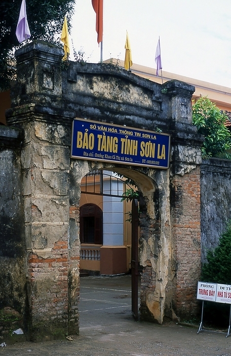 Vietnam: Son La Prison Museum, Northwest Vietnam Son La Prison Museum stands on a wooded hill rising over the town of Son La to the west of the Nam La River. It is an infamous prison dating from colonial times. It is an infamous prison dating from colonial times. A faded sign bearing the French word  P nitencier  still hangs above the menacing arched entrance. Son La was chosen by the French as the site for this former high security prison because of the town s isolation, cold weather and unhealthy climate. It was intended as a place not just of incarceration, but also of punishment, and it soon earned Son La a reputation among nationalists and revolutionaries as It was intended as a place not just of incarceration, but also of punishment, and it soon earned Son La a reputation among nationalists and revolutionaries as  Vietnam s Siberia.  bt   br    The prison also functioned as a clandestine revolutionary academy, and the list of political prisoners held here at one time or another includes such  bt   br  The prison also functioned as a clandestine revolutionary academy, and the list of political prisoners held here at one time or another includes such communist luminaries as Truong Chinh and Le Duan, both of whom would later serve as General Secretaries of the Vietnamese Communist Party.  The French bombed and partially destroyed the prison in 1952 during an attempt to expel Viet Minh forces that had seized Son La, but enough survives or has been rebuilt to show that it was Recalcitrant prisoners were tightly shackled and confined in windowless punishment cells. Deaths from malaria and other infections were high, while the prison guillotine saw frequent use. 