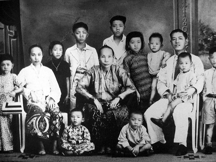 Singapore: A Peranakan or  Straits Chinese  family, c. 1910 Peranakan Chinese and Baba Nyonya are terms used for the descendants of late 15th and 16th century Chinese immigrants to the Indonesian Malay Archipelago during the Colonial era. br   br    Members of this community in Melaka identify themselves as  Nyonya Baba  instead of  Baba Nyonya . Nyonya is the term for the women and Baba for the men. It applied especially to the ethnic Chinese populations of the British Straits Settlements of Malaya and the Dutch controlled island of Java and other locations, who had adopted partially or in full Malay customs to become somewhat assimilated into the local communities. br   br    In colonial times they were an elite in Singapore, Melaka and Penang, identifying strongly with the British administration. Most have lived for generations along the Straits of Malacca. They were usually traders, the middleman of the British and the Chinese, or the Chinese and Malays, or vice versa because they were often educated in English. Because of this, they almost always had the ability to speak two or more languages. In later generations, some lost the ability to speak Chinese as they became more fully assimilated into the Malay Peninsula s culture and started to speak Malay fluently as a first or second language. br   br    While the term Peranakan is most commonly used among the ethnic Chinese for those of Chinese descent also known as Straits Chinese  named after the Straits Settlements , there are also other, comparatively small Peranakan communities, such as the Indian Hindu Peranakans  Chitty , Indian Muslim Peranakans  Jawi Pekan  and Eurasian Peranakans  Kristang or Christians  