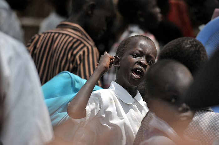 Kapoeta, South Sudan Elementary school students cheerfully sing a song before class at Kapoeta New Basic Elementary School in Eastern Equatoria State, South Sudan, February 2, 2012. Photo by Hiroyuki Miura