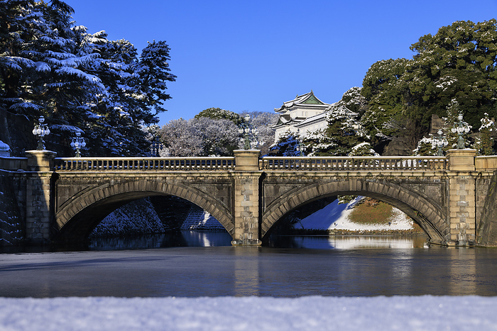 Nijubashi Bridge and Fushimi Tower at the Imperial Palace in snow, Tokyo