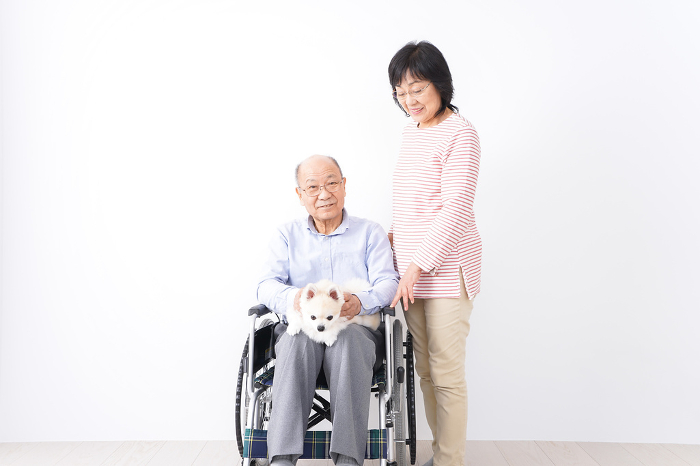 Elderly couple with a dog