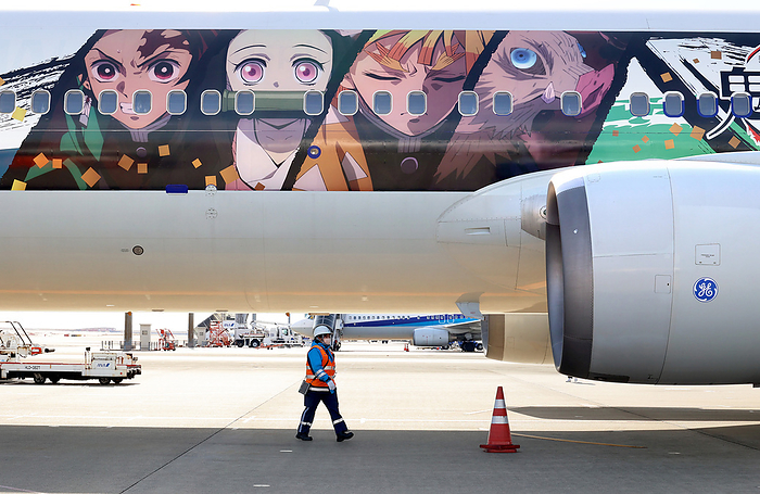 All Nippon Airways displays  Demon Slayer  jet designed with characters of comic of Demon Slayer January 30, 2022, Tokyo, Japan   Japanese largest air carrier All Nippon Airways   ANA  B 767 jet designed with characters of mega hit comics and animation series  Demon Slayer  is displayed at Tokyo s Haneda airport for a chartered flight on Sunday, January 30, 2022. ANA will start commercial flights of  Demon Slayer  jet on domestic routes from January 31.      Photo by Yoshio Tsunoda AFLO 