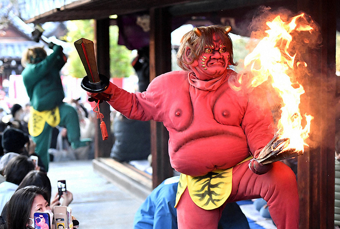 Demons performing powerful dance with torches in their hands in  Tsuina Ceremony Oni Hogaku Demons perform powerful dance with torches in their hands at  Tsuina Ceremony Demon Bugaku  in Kamigyo ku, Kyoto on the afternoon of February 3, 2022. 3:39 p.m., photo by Kazuki Yamazaki