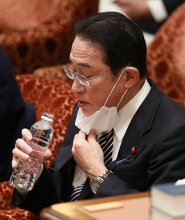 Diet, Budget Committee of the House of Representatives Prime Minister Fumio Kishida sips water at the Budget Committee of the House of Representatives in the Diet on February 07, 2022.