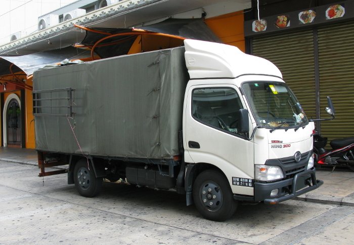 Small truck made in Japan, rear wheels also single tire (George Town, Penang Island)