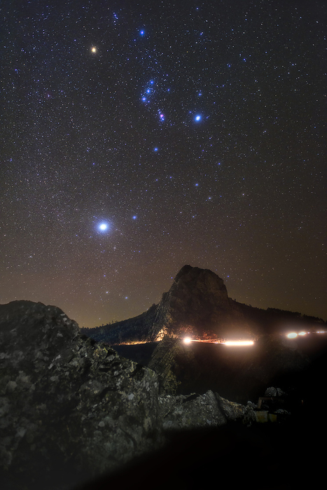 Night sky over a hill Sirius star and Orion constellation  upper centre  seen over Pampilhosa da Serra hill, Aldeias do Xisto Dark Sky Reserve, Portugal., Photo by MIGUEL CLARO SCIENCE PHOTO LIBRARY