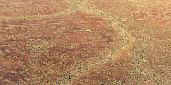 Australia s Interior Central South Australian aerial landscape looking straight down at dry arid landscape from central South Australia. Aerial images over the Painted Desert, Dry Creek Beds, and scrub bushland