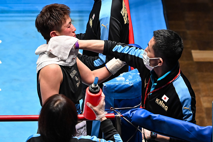 Japan Women s Featherweight Title Match Kimika Miyoshi, left, has sweat wiped off her face by Kawasaki Nitta Boxing Gym chairman Shosei Nitta as she waits for the judges decision after the final round during the Japanese Female Feather Title bout at Korakuen Hall in Tokyo, Japan, February 14, 2022.  Photo by Hiroaki Finito Yamaguchi AFLO 