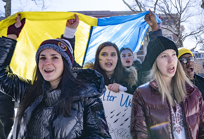 Ukrain rally at Harvard University February 26, 2022, Harvard University, Cambridge, Massachusetts, USA: People rally and march to show solidarity with Ukraine during  Harvard Stands with Ukraine  rally on Harvard Yard at Harvard University in Cambridge. 