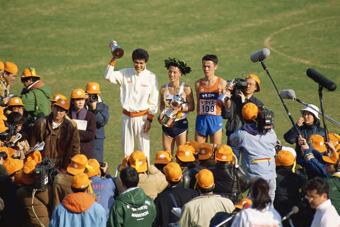 Koichi Morishita (Asahi Kasei), Takeyuki Nakayama (Daiei) and Toshiyuki Hayata (Kanebo),
FEBRUARY 9, 1992 - Marathon : Koichi Morishita (C, 1st), Takeyuki Nakayama (L, 2nd) and Toshiyuki Hayata (R, 3rd) celebrate on the podium after the 1992 Tokyo International Marathon at National Stadium in Tokyo, Japan.
(Photo by Shinichi Yamada/AFLO) [0348].