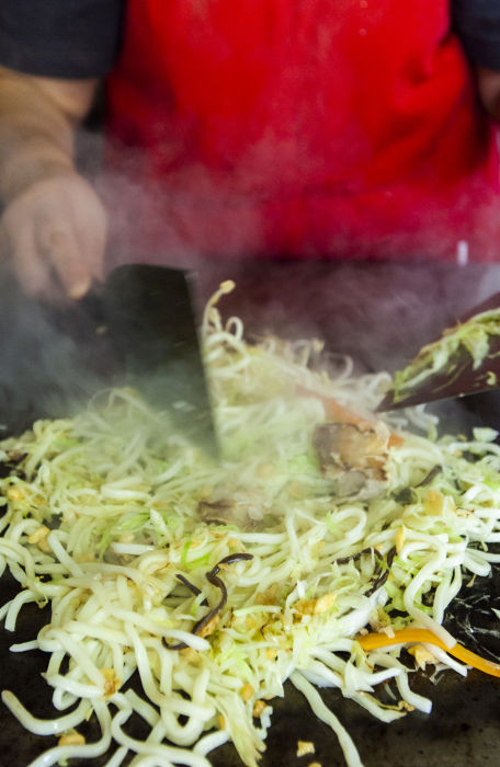 Making okonomiyaki Local cuisine/Hiroshima