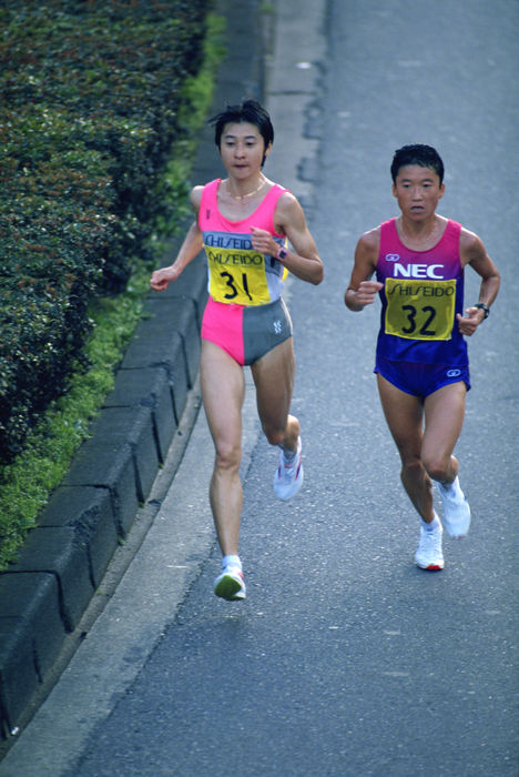 Mari Tanigawa (Shiseido), Eriko Asai (NEC)
NOVEMBER 21, 1993 - Marathon : Mari Tanigawa #31 and Eriko Asai #32 compete during the 1993 Tokyo International Women's Marathon in Tokyo, Japan.
(Photo by Shinichi Yamada/AFLO) [0348].