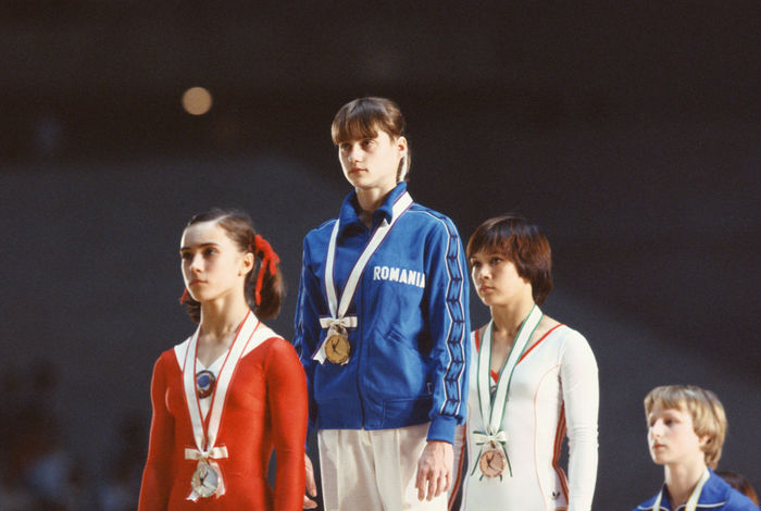 Nadia Comaneci (ROM),
JUNE 4, 1979 - Artistic Gymnastics : Nadia Comaneci of Romania (C) celebrates on the podium during the Women's Gymnastics at the 1979 World Cup.
(Photo by Shinichi Yamada/AFLO) [0348]
