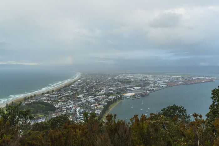 New Zealand Beach and city view from Mauao Hill on Mount Maunganui, a peninsula in Tauranga Bay, New Zealand