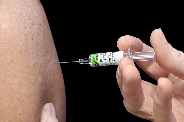 Seasonal flu vaccine Patient receiving the 202 2022 seasonal influenza  flu  vaccine for the northern hemisphere. This is a quadrivalent vaccine that protects against two strains of influenza A, an H1N1 strain and an H3N2 strain, and two strains of the influenza B virus., Photo by DR P. MARAZZI SCIENCE PHOTO LIBRARY