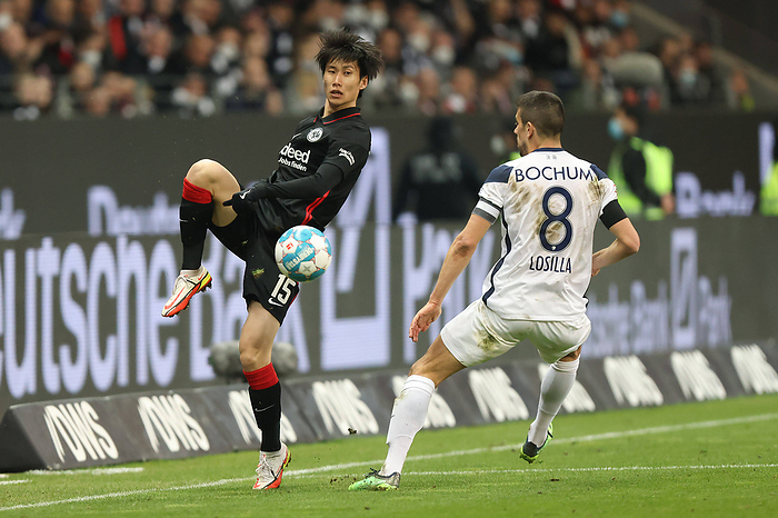 Eintracht Frankfurt   VfL Bochum, 1. FBL Daichi Kamada  Eintracht Frankfurt, 15  gegen Anthony Losilla  VfL Bochum, 8 .     Eintracht Frankfurt VfL Bochum, 1 FBL Daichi Kamada Eintracht Frankfurt, 15 against Anthony Losilla VfL Bochum, 8 Bundesliga match between Eintracht Frankfurt and VfL Bochum on 13 March 2022 at Deutsche Bank Park in Frankfurt am Main According to the requirements of the DFL, German Football League, it is prohibited in the stadium and or from the game made photographs in the form of sequence images and or video like photo series to exploit or to let exploit , Frankfurt am Main Hesse Germany Deutsche Bank Park
