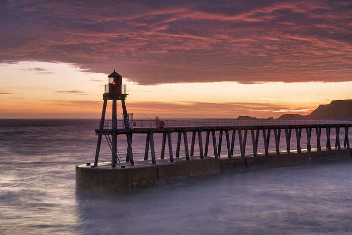 Sunrise over Whitby harbour and the River Esk, The North Yorkshire Coast, UK. Sunrise over Whitby harbour and the River Esk, The North Yorkshire Coast, Yorkshire, England, United Kingdom, Europe, Photo by John Potter