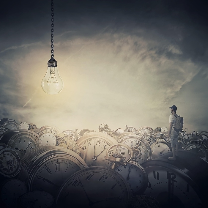 Surreal view as a man, with a bag in his back, stand in the midle of a clock trash looking at a huge light bulb glowing. Time pressure, hour perception and idea concept, Photo by PsychoShadow