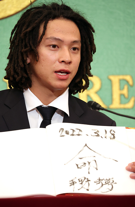Beijing Olympics men s snowboard halfpipe gold medalist Ayumu Hirano holds a press conference March 18, 2022, Tokyo, Japan   Japanese snowboarder Ayumu Hirano who won the gold of Beijing Winter Olympics men s snowboard halfpipe displays his calligraphy of the word  life  at a press conference at the Japan National Press Club in Tokyo on Friday, March 18, 2022. Hirano who won the solvers at 2014 and 2018 Olympics made a landing of the triple cork 1440 at the final and cliched the gold.   Photo by Yoshio Tsunoda AFLO  