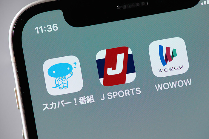 smartphone app The logos of mobile apps SKY PerfecTV , J SPORTS and WOWOW, are displayed on a screen in Tokyo, Japan, February 16, 2022.  Photo by Shingo Tosha AFLO 