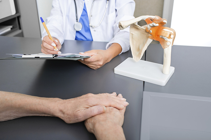 Orthopaedic consultation Orthopaedic consultation., by PEAKSTOCK   SCIENCE PHOTO LIBRARY